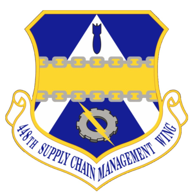 Logo der 48. Versorgungsmanagementstaffel mit einem blauen Schild mit einem weißen Stern, einem weißen Banner mit blauer Schrift, die "Versorgungsmanagement" lautet, und schwarzer Schrift "48. Versorgungsmanagementstaffel" in fetter Schrift.
