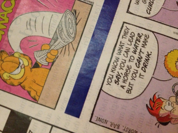 Ein Blatt mit Cartoons und Text.